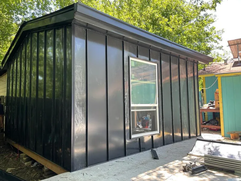 Black standing seam metal wall panels for Metal Roof Installation in Gustine